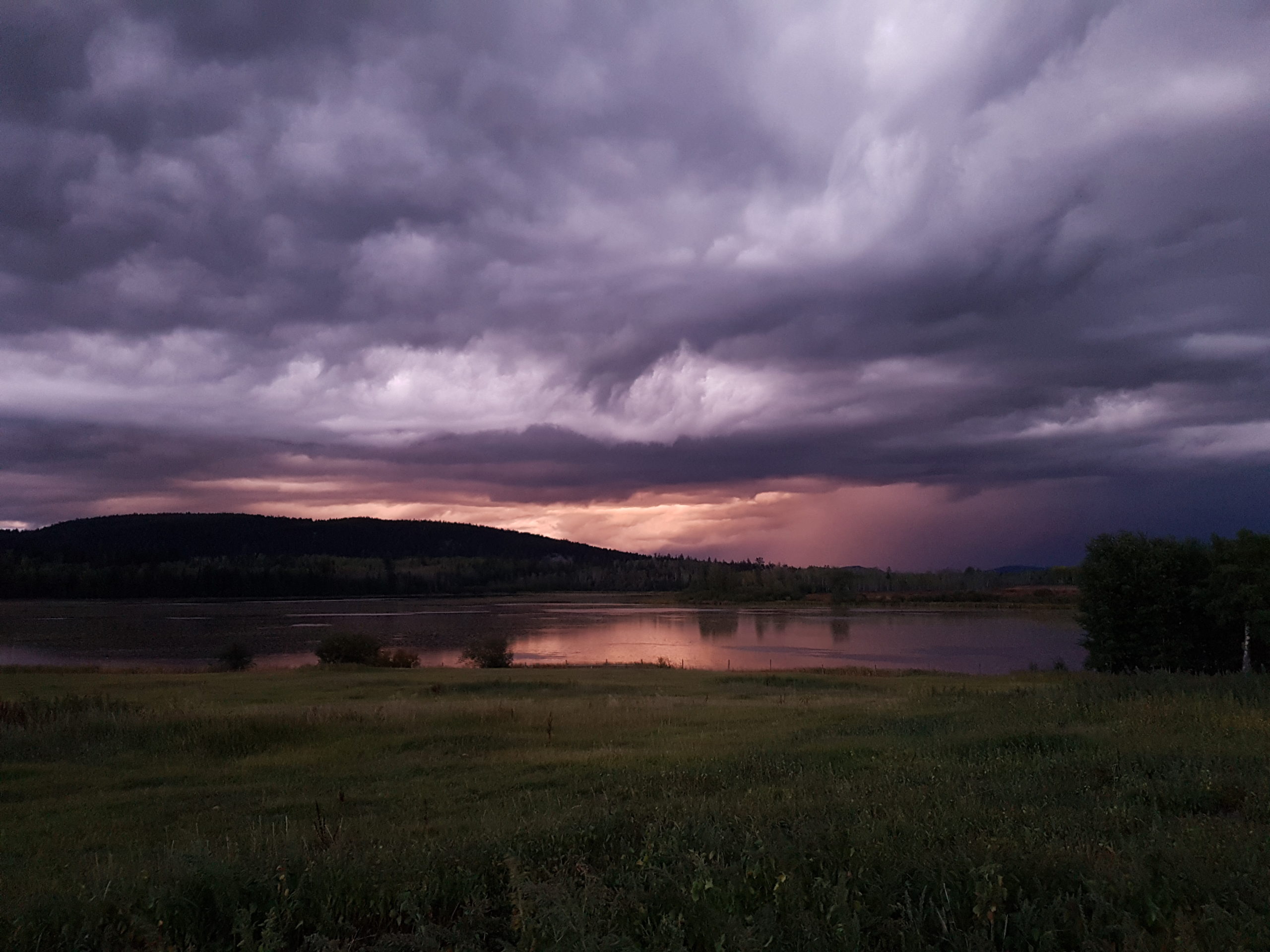 storm clouds at sunset over Hart Lake