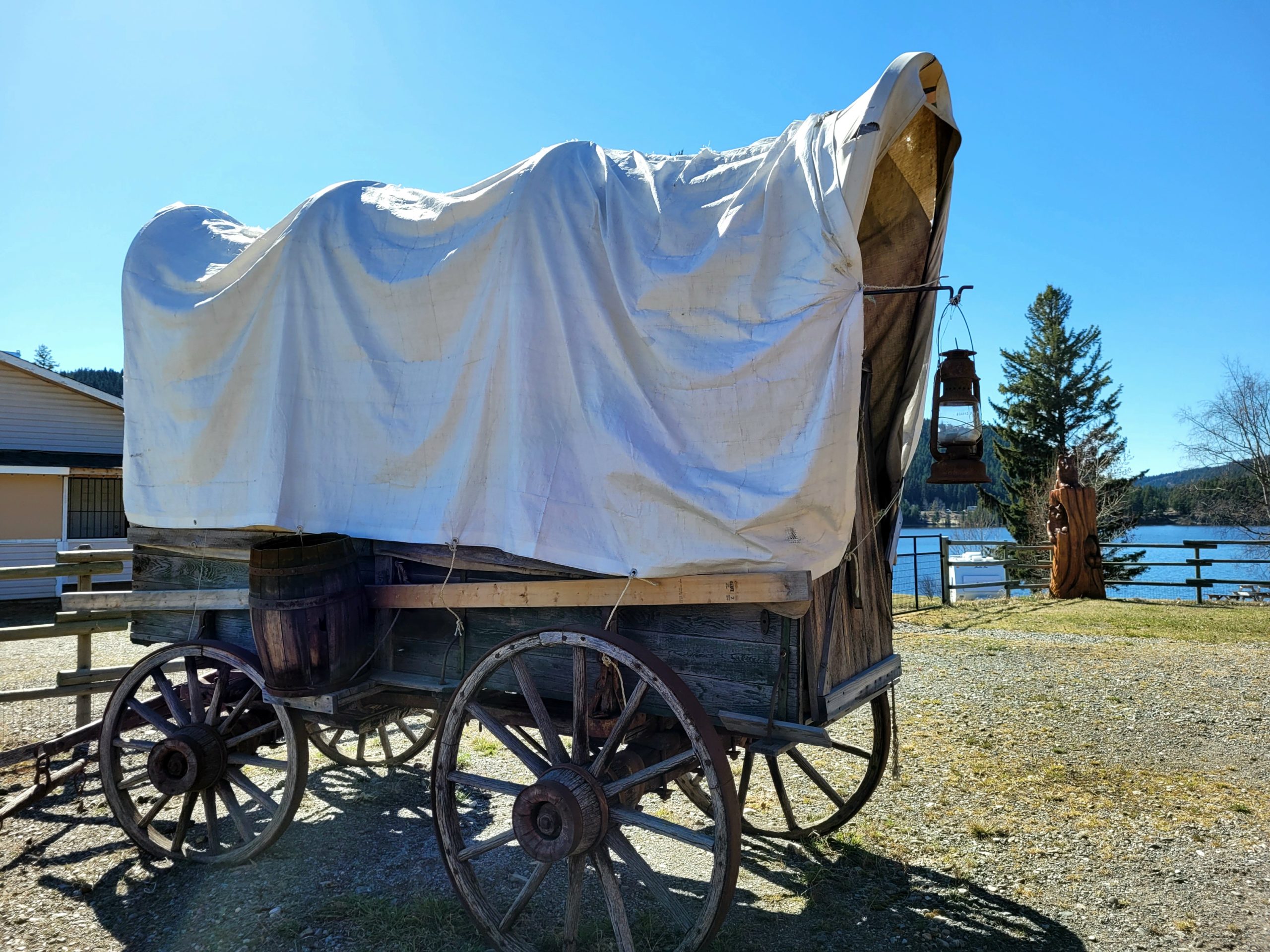 photo of an old covered wagon on a sunny day