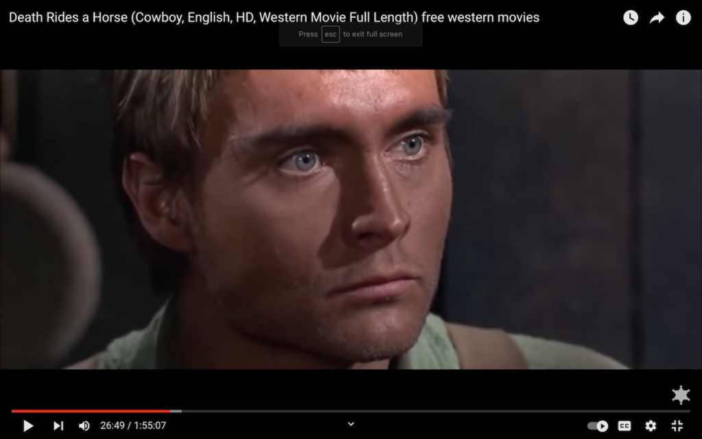 youtube screenshot showing a closeup of john phillip law's face looking like zac efron