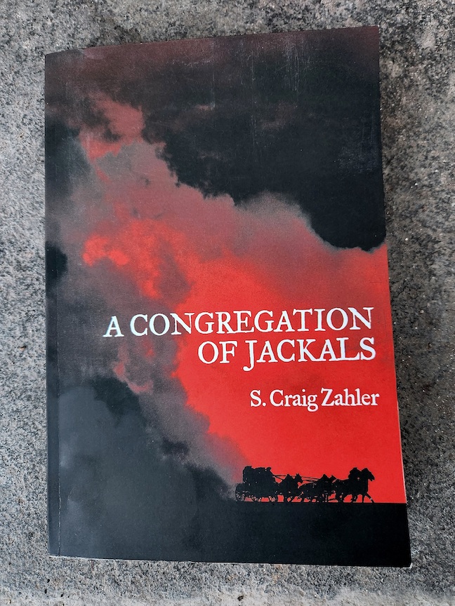 photo of A Congregation o Jackals book against pale cement