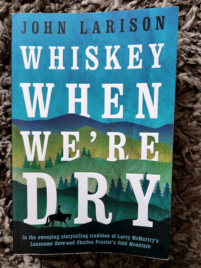 photo of the novel Whiskey When We're Dry on a shag rug