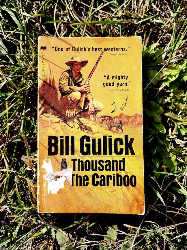 photo of the book A Thousand for the Cariboo against grass