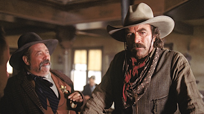 barry corbin standing with tom selleck in crossfire trail