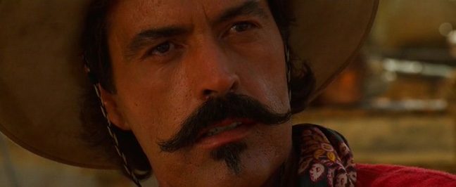 screenshot of powers boothe in tombstone