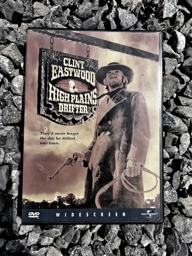 photo of the high plains drifter DVD against a dark, rocky background