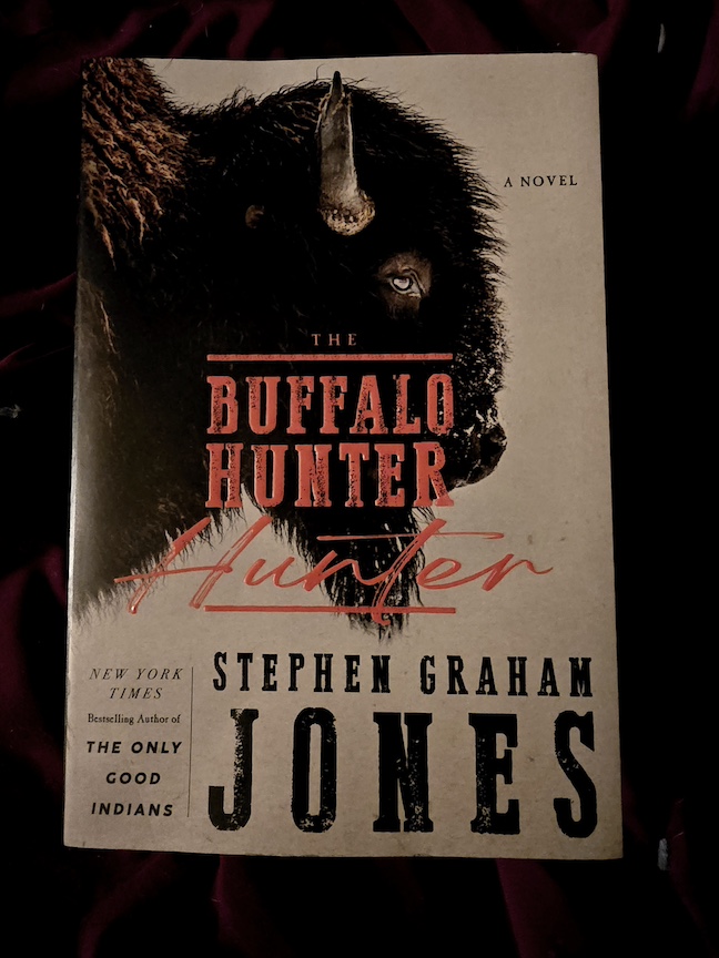 photo of the book The Buffalo Hunter Hunter against a dark cloth background