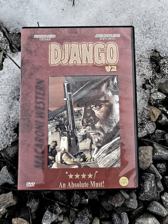 photo of the Django DVD against snow on large gravel